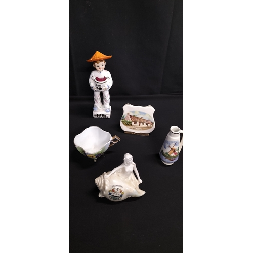 244 - Box of mixed ornaments including figurines with pin cushion and tape measure, Carlton ware ginger ja... 