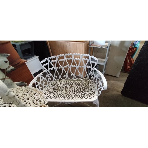 257 - White cast iron garden set. Table bench seat and chair. Collection only