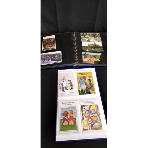 293 - Two photograph albums containing vintage postcards from various places and eras