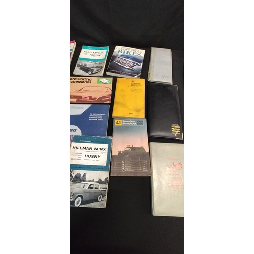 299 - Collection of vintage books on various cars and two businesses card wallets