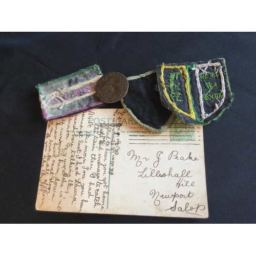 129 - RARE COLLECTION OF SUFFRAGETTE POSTCARD AND VOTES FOR WOMEN COIN AND CLOTH PATCHES