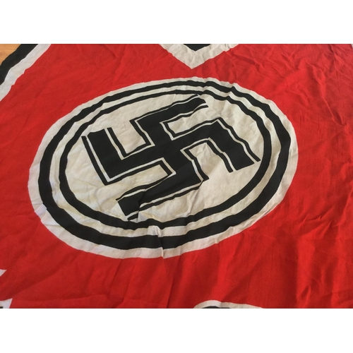 17 - WW2 1939 DATED GERMAN OKW FLAG WITH SWALLOW TAIL AND VARIOUS STAMPS IN LEADING EDGE. 59 INCHES LONG