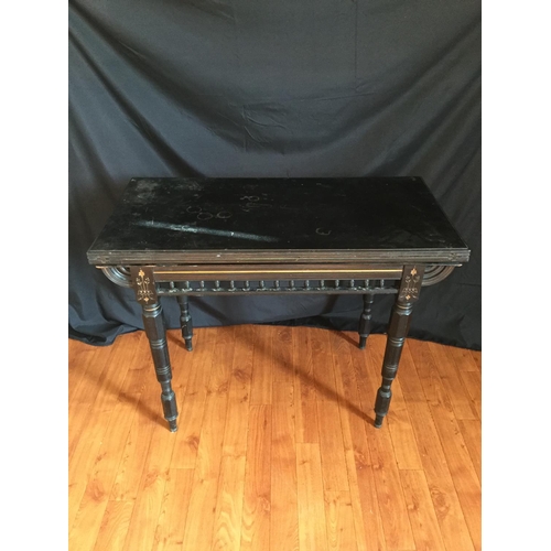 175 - AN ARTS & CRAFTS EBONISED CARD TABLE