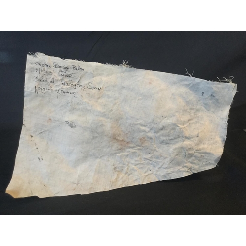 25 - ORIGINAL SECTION OF BATTLE OF BRITAIN BARRAGE BALLOON WITH HISTORY IN REVERSE SIDE. 21CM LONG.