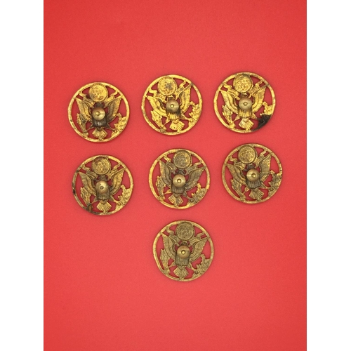 12 - 7 x American military cap badges with screw fitting.