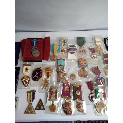 199 - Large collection of masonic badges and medals