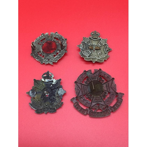 21 - 4 x Border Regiment military cap badges