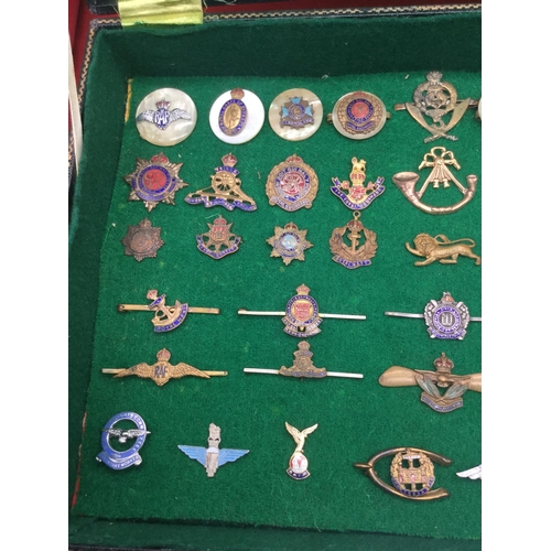 44 - Large collection of military sweetheart brooches from various regiments 45 in total