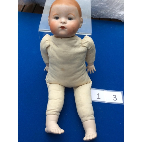 112 - 15 german bisque doll R127 with cloth body est 20-30