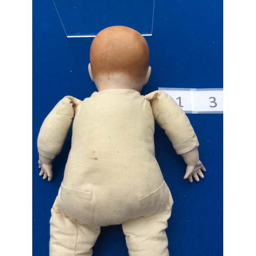 112 - 15 german bisque doll R127 with cloth body est 20-30