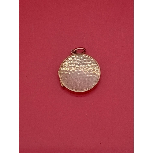 12 - 9ct gold locket 4.7 grams. Front and back