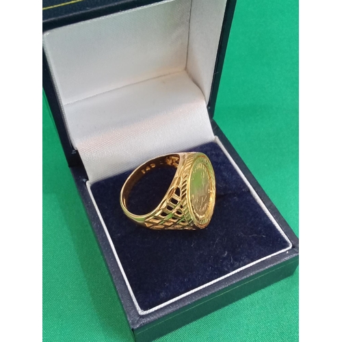 23 - 22ct gold 1/10 Krugerrand ring. 1986 coin. Ring also 22ct gold. 10.9 grams