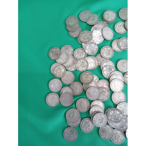 53 - Large quantity of 50% silver shilling coins. 545 grams