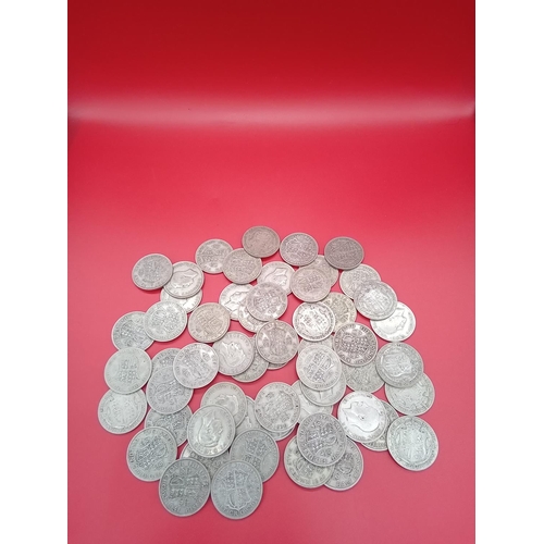 55 - Large quantity of 50% silver Half Crowns. 777 grams