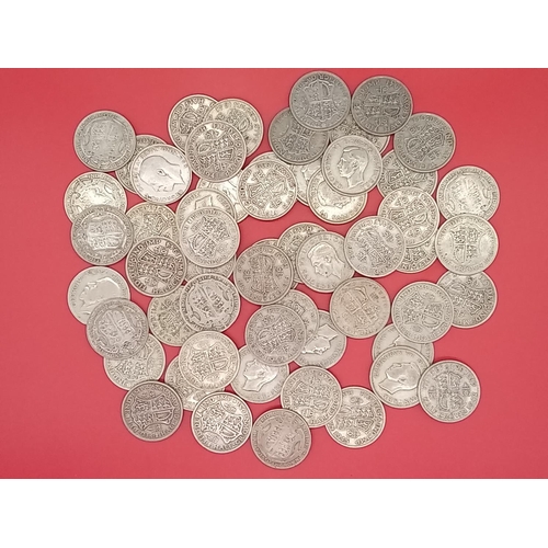 55 - Large quantity of 50% silver Half Crowns. 777 grams