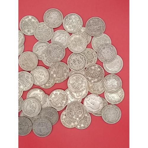 55 - Large quantity of 50% silver Half Crowns. 777 grams