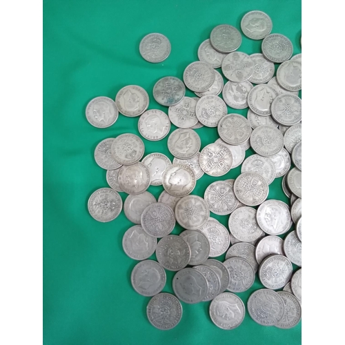 58 - Large quantity of 50% silver two shillings. 1224 grams