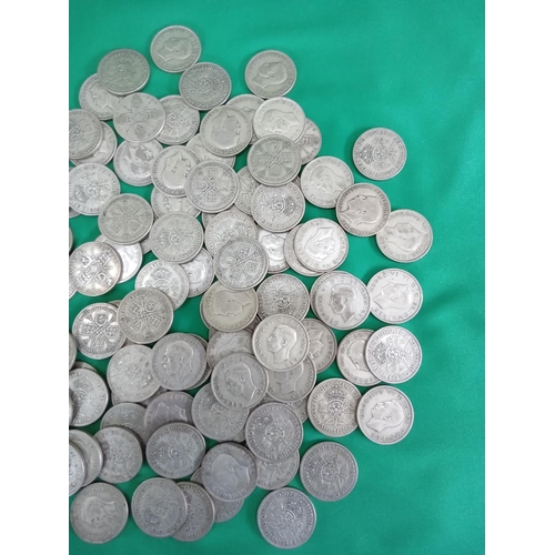 58 - Large quantity of 50% silver two shillings. 1224 grams