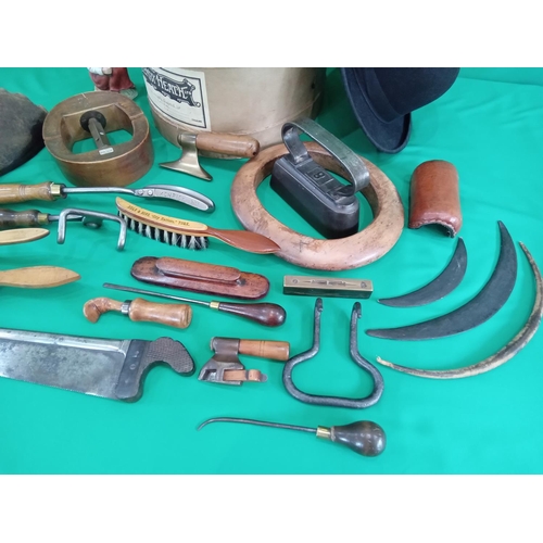 77 - A large collection of unusual antique hat makers tools including bowler hat.