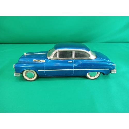 95 - Vintage tin plate car with push along motor 11 inches in length