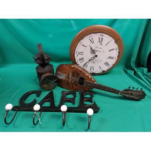 107 - 4 misc items including Cafe sign, Clock, Musical instrument and Lantern