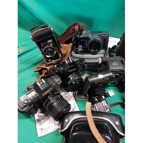 35 - Large collection of vintage cameras 17 in total including Bellows, cannon, Kiev, Halina, Ilford and ... 