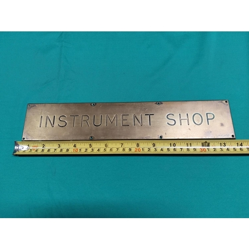 52 - Brass sign for Instrument Shop