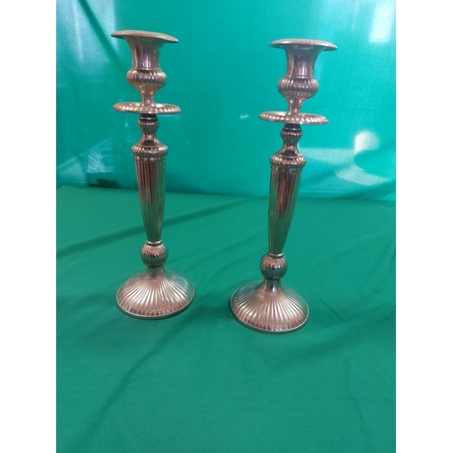 116 - Pair of silver plated candle sticks