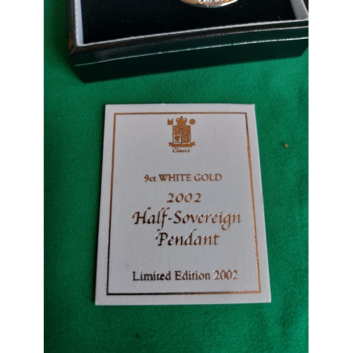 17 - 2002 half gold sovereign in 9ct white gold pendant