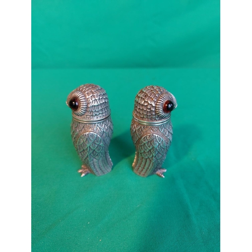 29 - Hallmarked silver owl salt and pepper (owl missing one glass eye) 196 grams