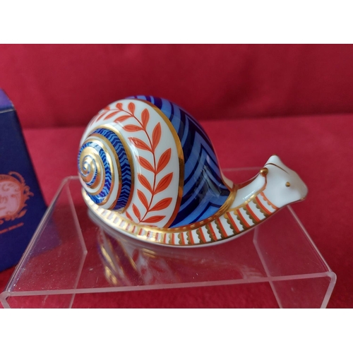 219 - Royal Crown Derby snail paperweight in original box.