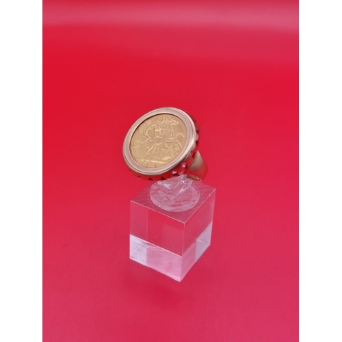 33 - Half sovereign ring with 9ct band 9.2 grams