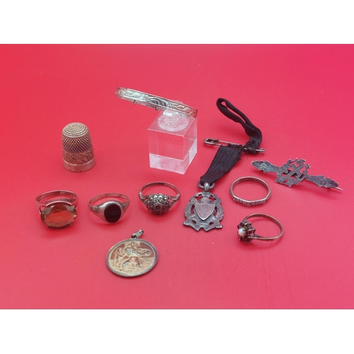 64 - Collection of silver items inc 5 rings & other items 40 grams