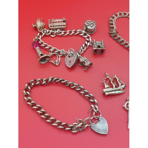 65 - Hallmarked silver charm bracelet with spare charms and 2 other silver bracelets. 110 grams