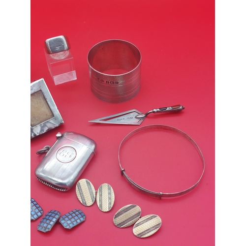 72 - Collection of silver hallmarked items including vesta, book mark, napkin rings etc. 188 grams