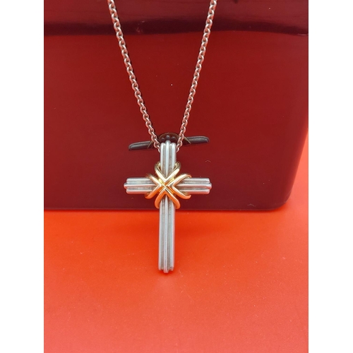 76 - Tiffany & Co stirling silver & 18ct gold crucifix necklace