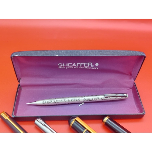 79 - Collection of pens and Hallmarked silver Sheaffer propelling pencil in case