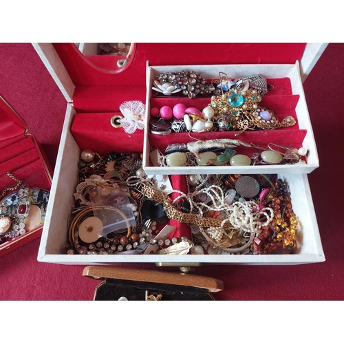 84 - 2 boxes of mixed costume jewellery.