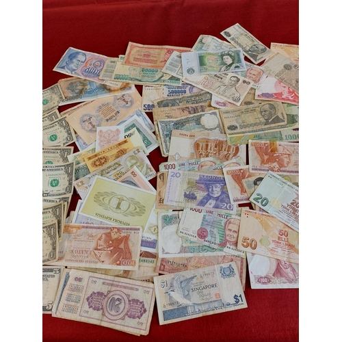 125 - Large collection of banknotes including dollars.