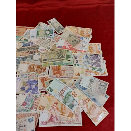 125 - Large collection of banknotes including dollars.