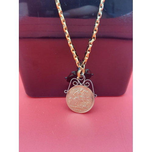 13 - Half Sovereign pendant on 9ct gold necklace. Weight 10 grams