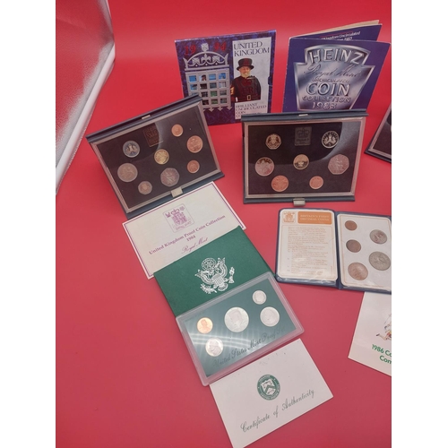 155 - Collection of mixed proof coin sets. UK 1984, 1985 x 2, 1986, USA 1976, 1994 and others.