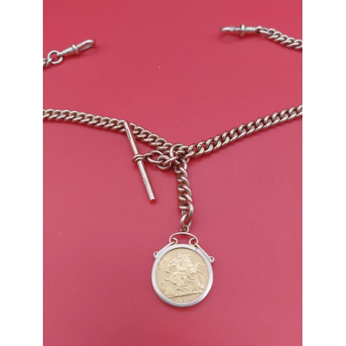 21 - 9ct gold albert chain with half sovereign. 16