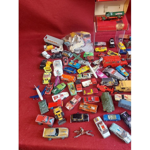 214 - Large collection of playworn die cast model cars and other vehicles. Includes some vintage Dinky toy... 