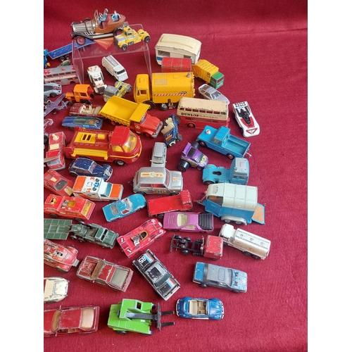 214 - Large collection of playworn die cast model cars and other vehicles. Includes some vintage Dinky toy... 