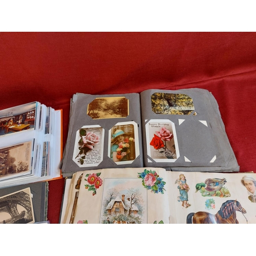 266 - Large collection of postcard albums with cards and loose postcards.