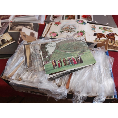 266 - Large collection of postcard albums with cards and loose postcards.