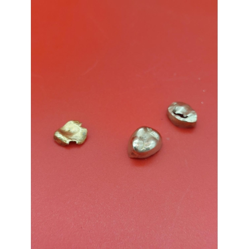 33 - gold teeth 5.5 grams