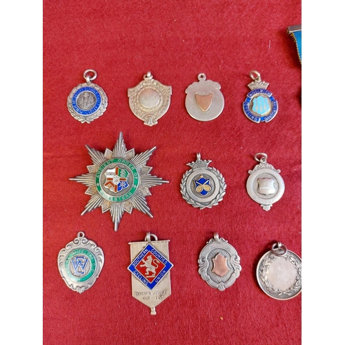 64 - Collection of hallmarked silver fobs and medals 18 in total.