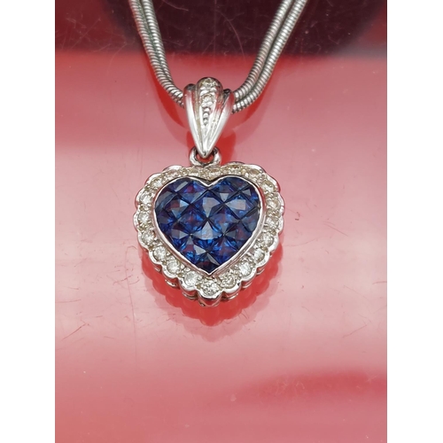 8 - Stunning 18ct white gold diamod and sapphire pendant set in the shape of a heart